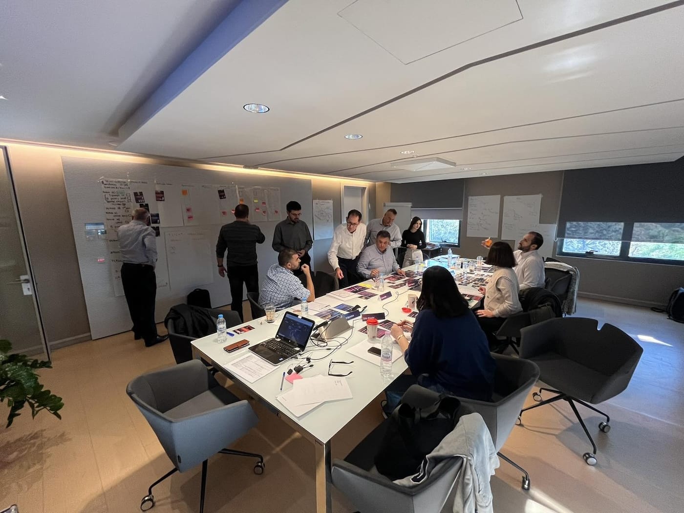 Professionals collaborating in a development workshop